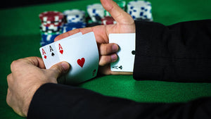 How to Cheat at Poker with a Partner?